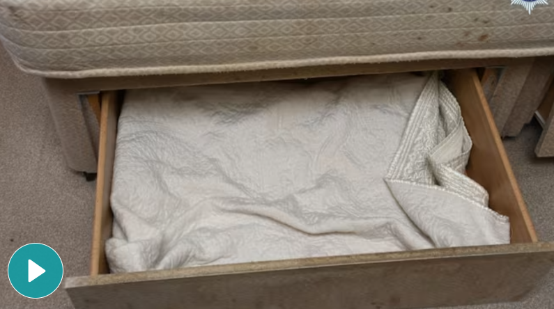 Mother keeps child trapped in a drawer